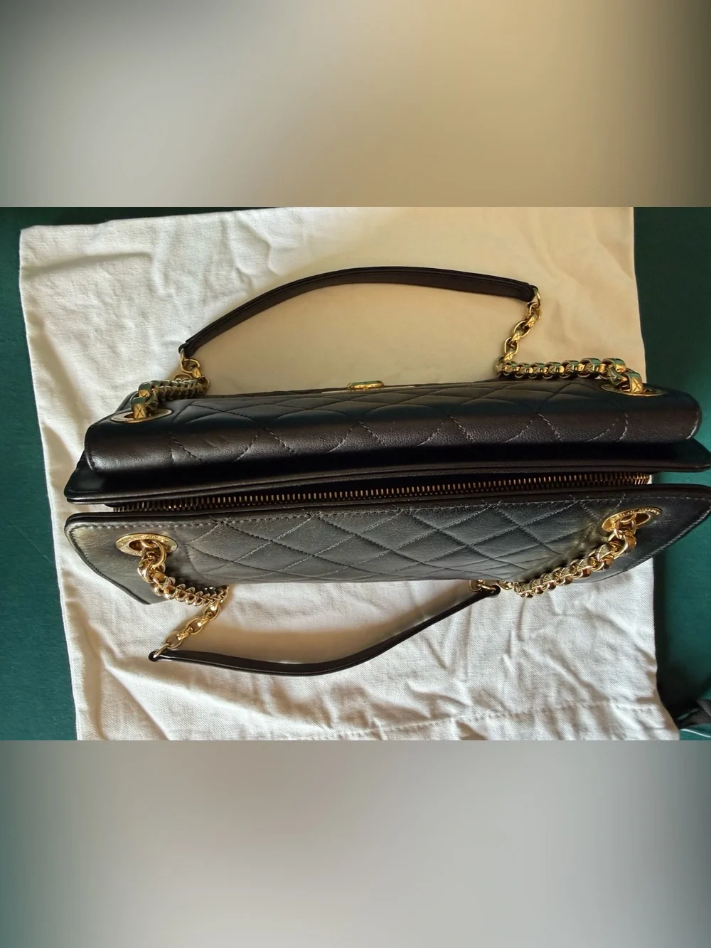 CHANEL Black Quilted Leather Shoulder Bag with Gold Hardware